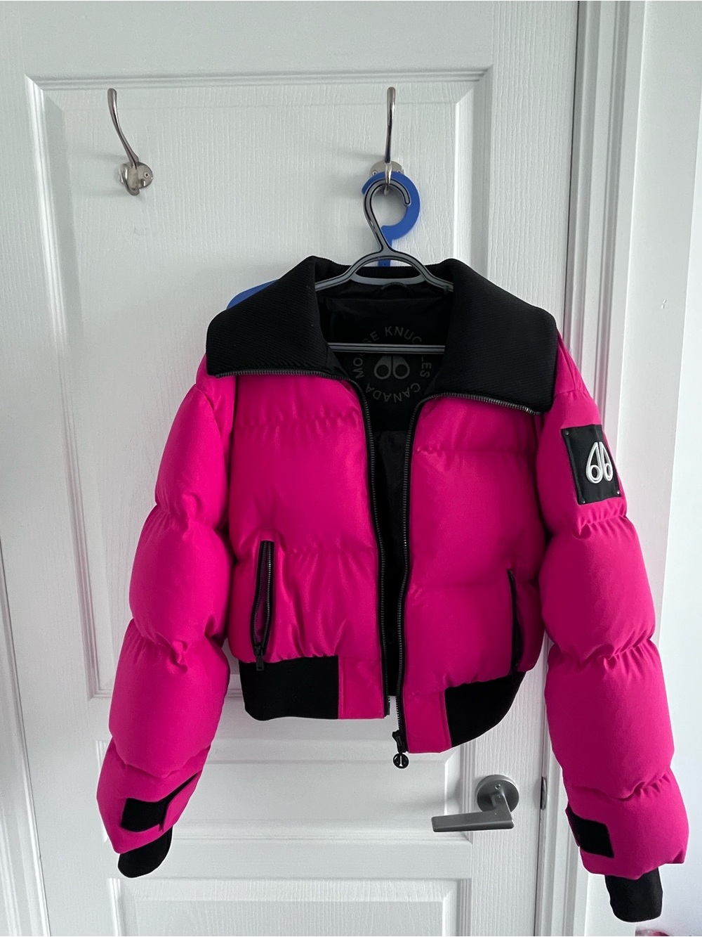 Moose knuckle pink puffer jacket